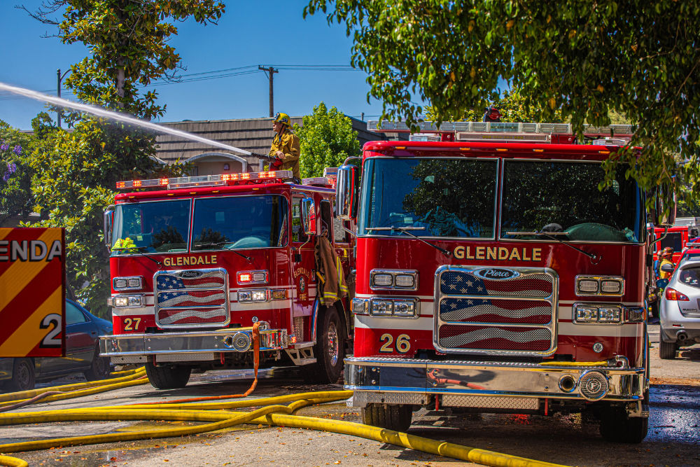 Two Pierce Mfg. engines on the scene of a residential fire