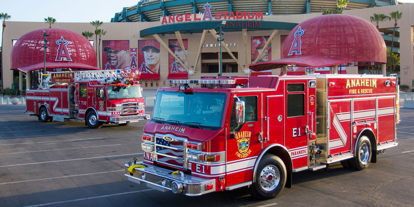 Two Anaheim pumpers in front of stadium